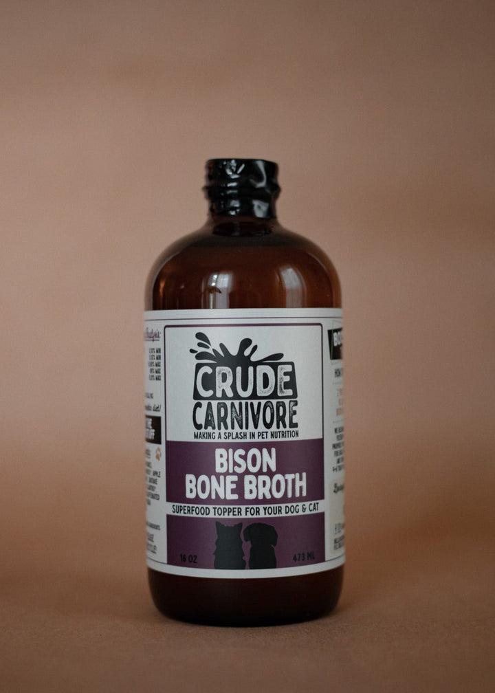 Bottle of Crude Carnivore Bison Bone Broth on a brown background