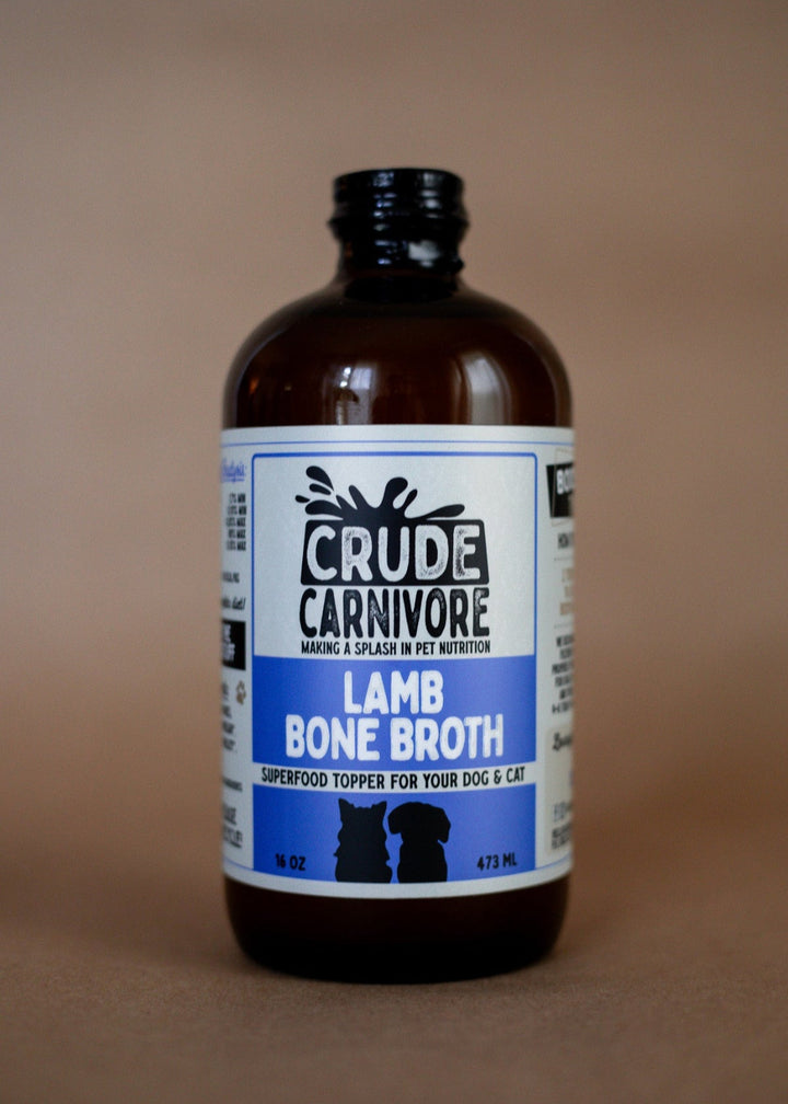 Bottle of Crude Carnivore Lamb Bone Broth on a brown background