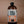 Load image into Gallery viewer, Bottle of Crude Carnivore Pork Bone Broth on a brown background
