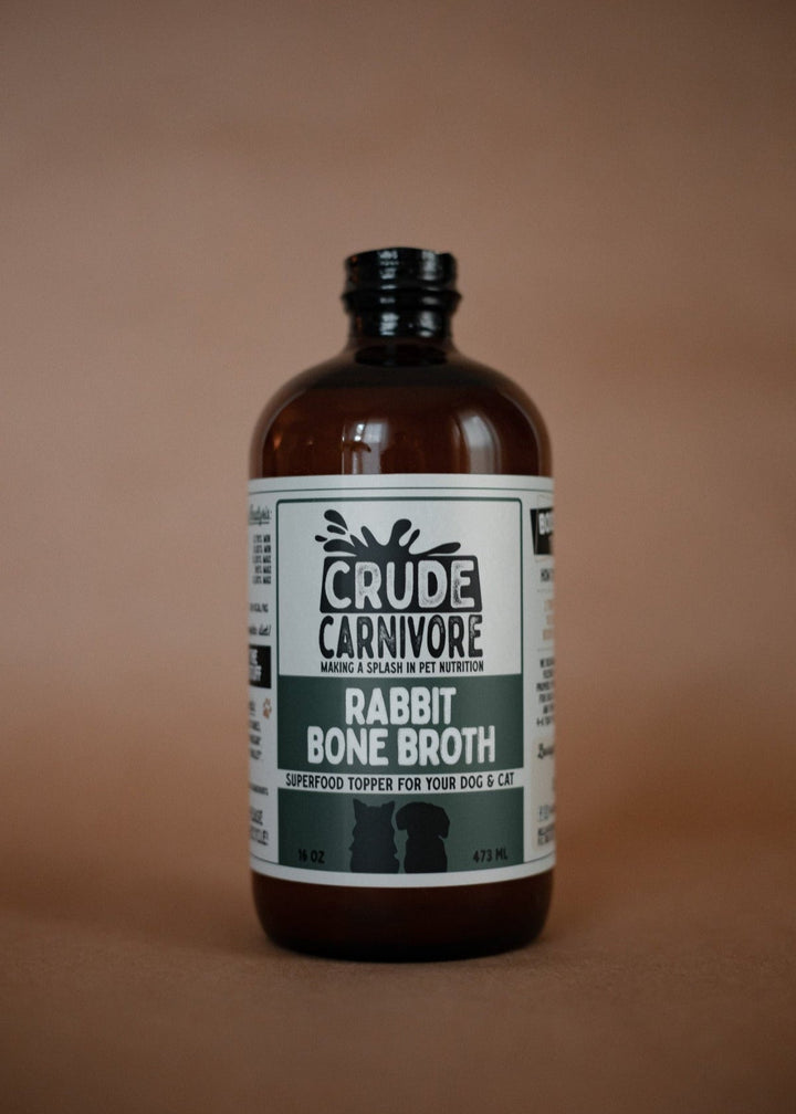 Bottle of Crude Carnivore Rabbit Bone Broth on a brown background